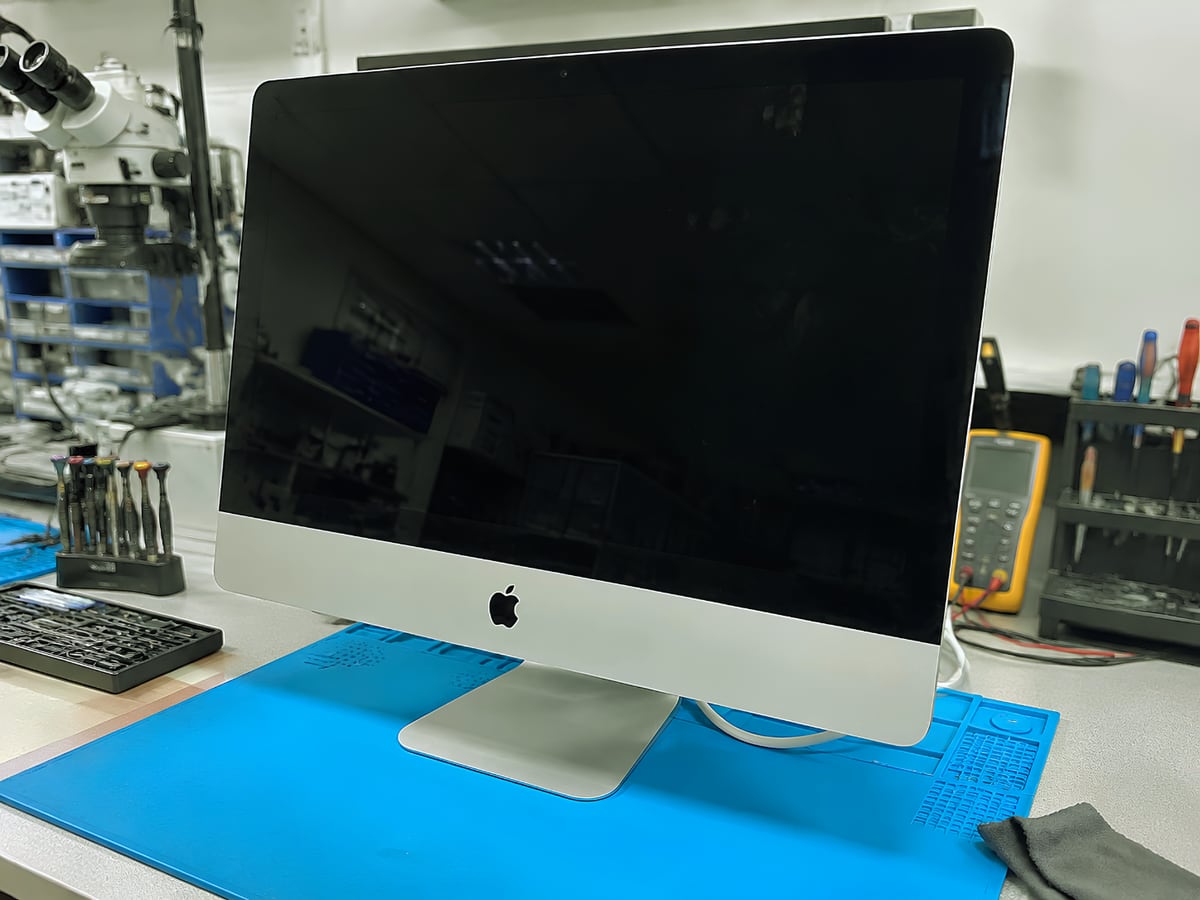 iMac on the bench at iProduct Repair in HSR Layout, Bangalore with a black screen