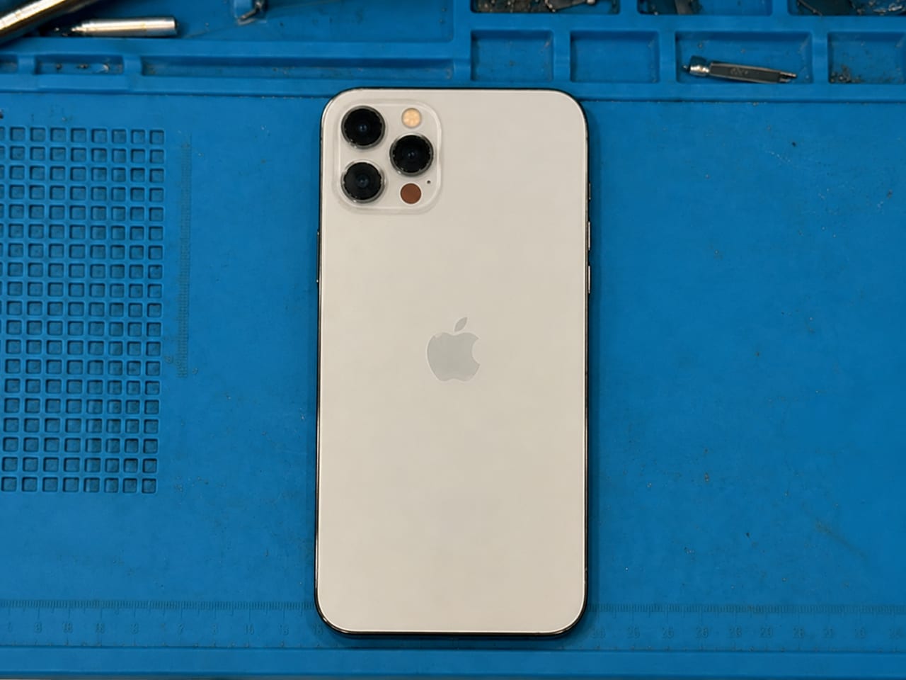 The same iPhone 12 Pro Max with a clean new back glass after replacement in Bangalore